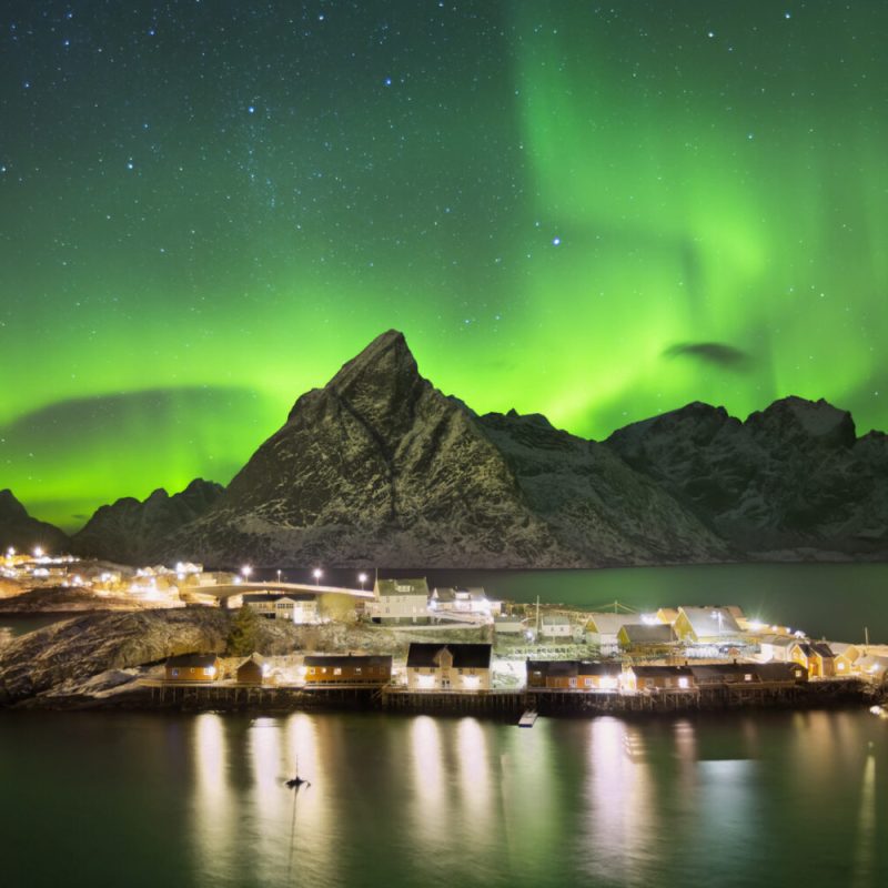 Aurora borealis over a village on the Lofoten in Norway