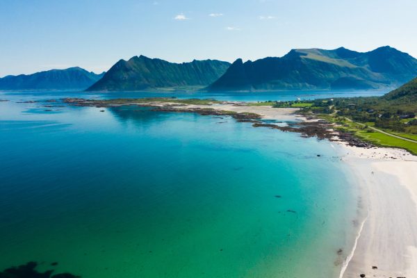 Coast of Gimsoya island, Gimsoysand sandy beach in summer. Nordland county, Lofoten archipelago Norway. Tourist attraction.